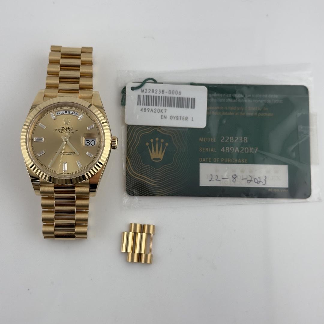 Rolex Day-Date 40 Champagne Baguette Diamond Dial on President Ref 228238 with New Style Card Green
